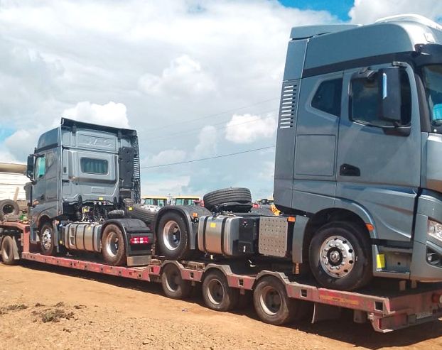 Delivery of cars on trailers